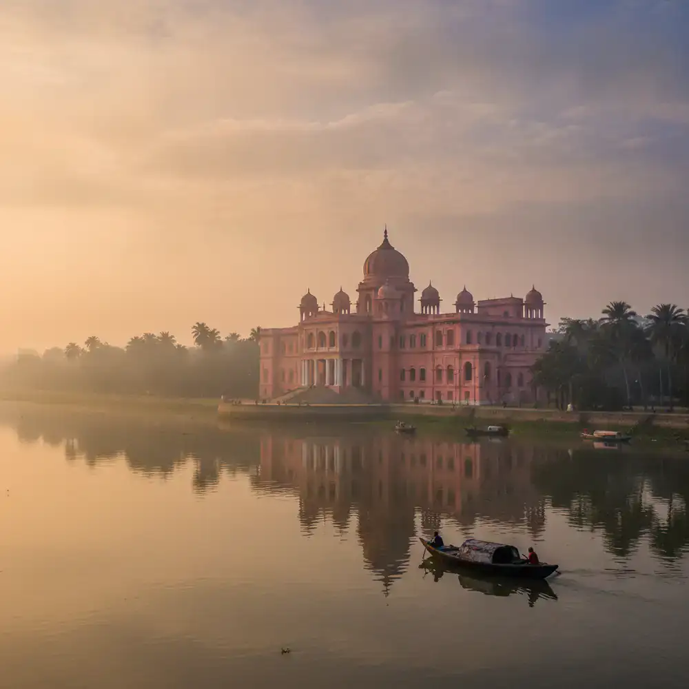 The pink palace of Ahsan Manzil along the river
